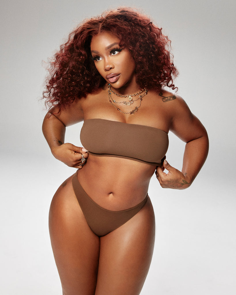 Hold up, fashionistas! You need to hear this breaking news: Target just dropped a Barbiecore bombshell! SZA, the queen of R&B and fashion, was spotted slaying a $20 bikini from Target that screams "I'm a living Barbie doll."